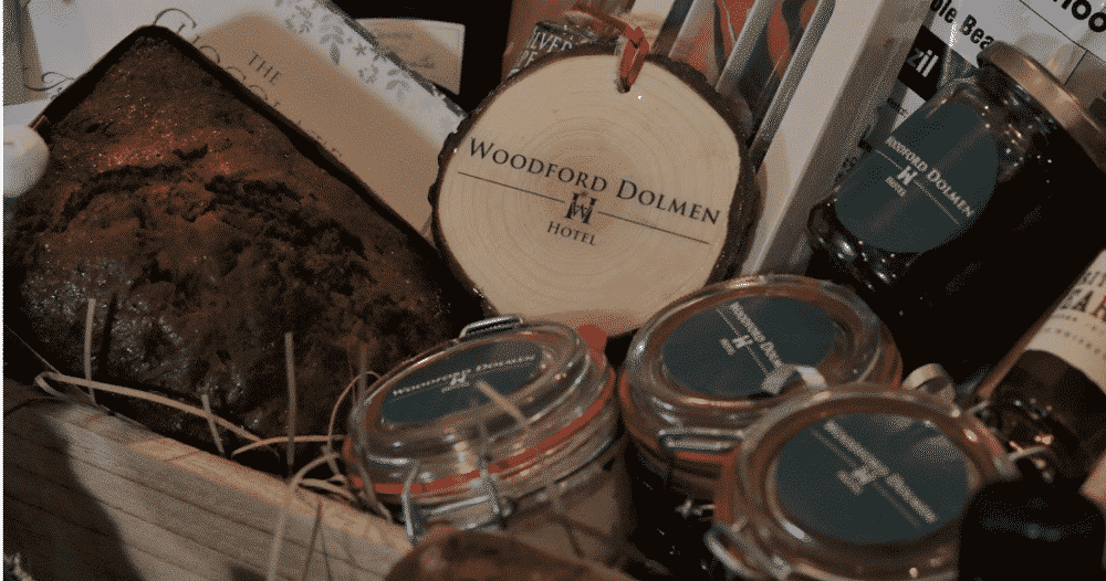 Woodford Dolmen Hotel Gift hamper on table