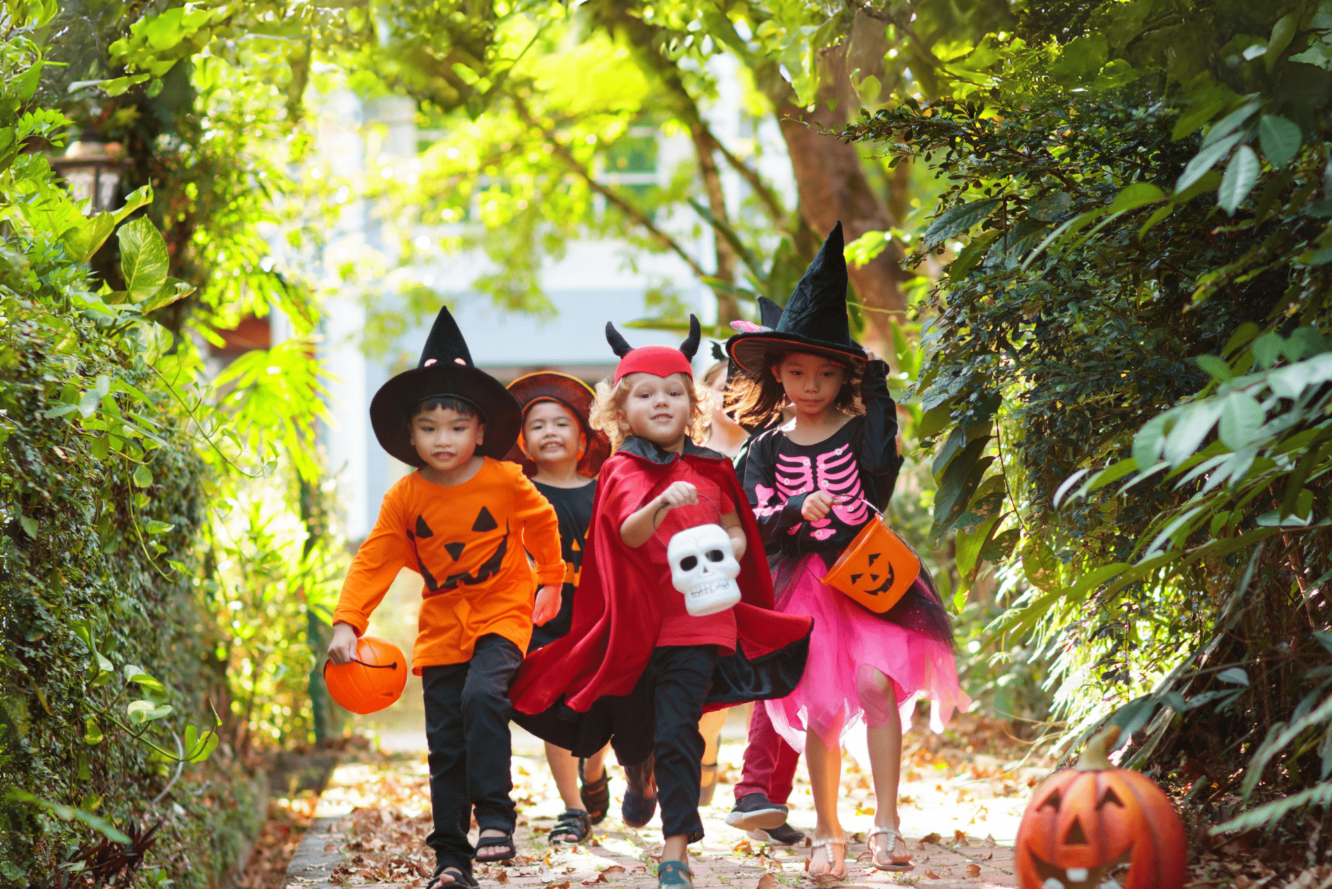 Family breaks - Kids dressed up in Halloween costumes.