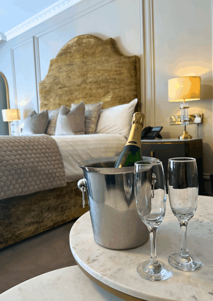 Wedding Suite with Champagne Bottle and Two Glasses