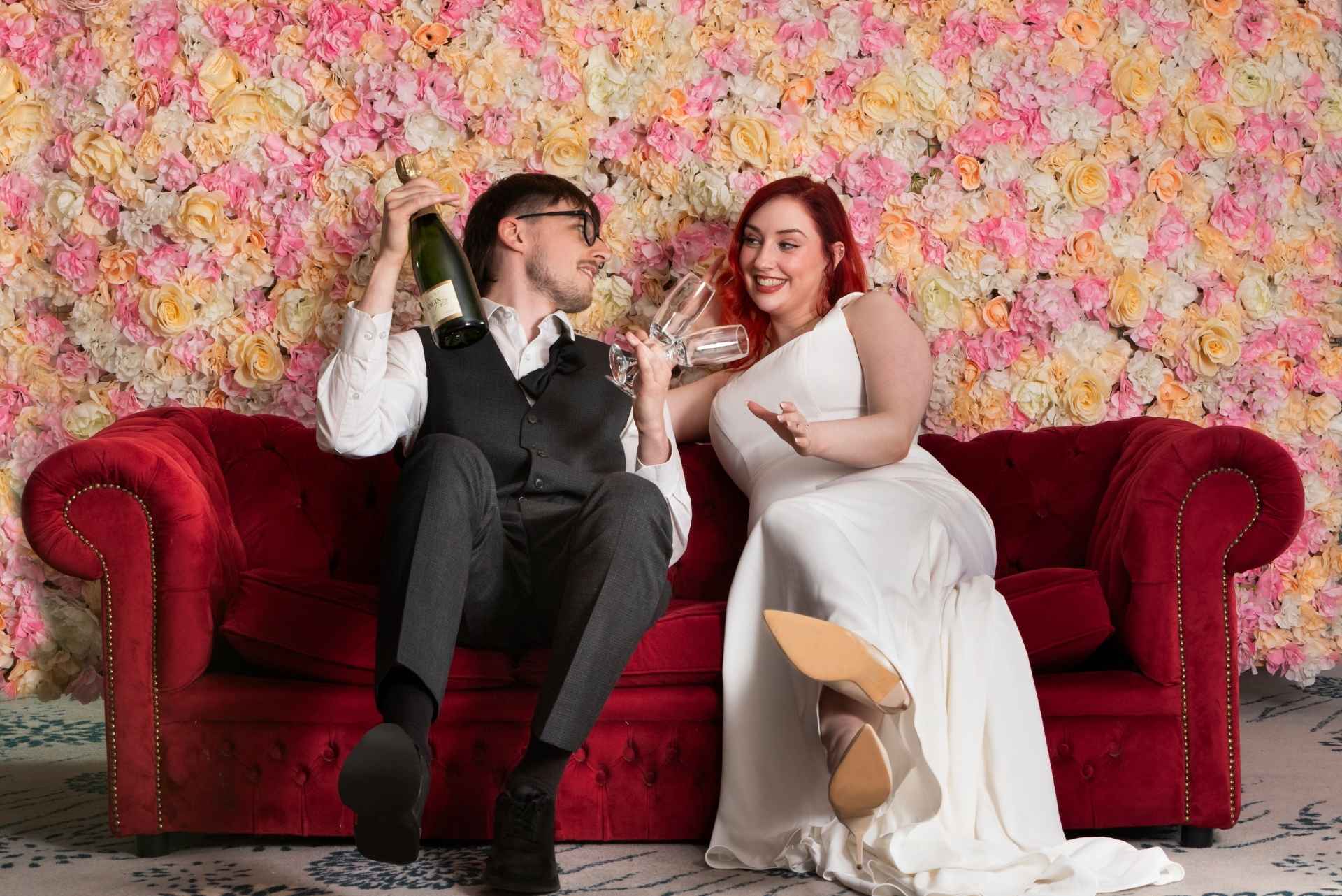 Bride and Groom at the Woodford Dolmen Hotel sat down with bottle and glasses of champaign